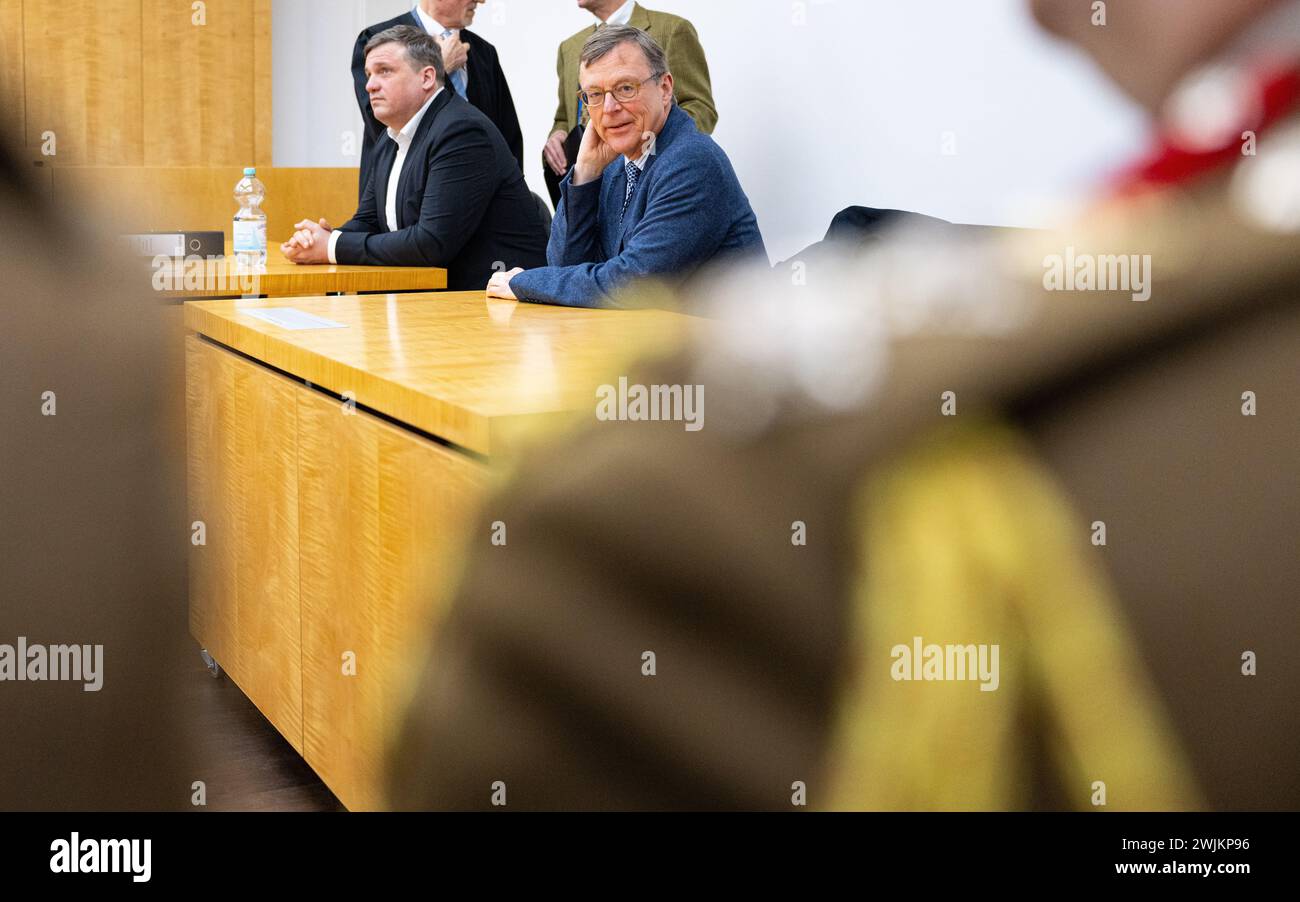 16 February 2024, North Rhine-Westphalia, Münster: Stephan Prinz zur Lippe (r) and Jan Lackmann (l), Managing Director of WestfalenWIND Planungs GmbH & Co. KG sit before the Higher Administrative Court for the state of North Rhine-Westphalia. The OVG is hearing the dispute over the construction of 13 wind turbines in the district of Lippe. The planned facility is located on the heights of the Teutoburg Forest in the vicinity of the Senne military training area used by the British. The Bundeswehr had initially approved the construction, but then pointed out the risk to the safety of military ai Stock Photo
