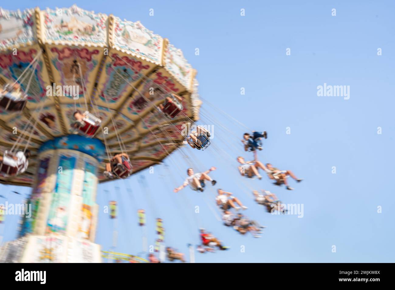 People Up In The Air On Swings at Tulsa State Fair Stock Photo