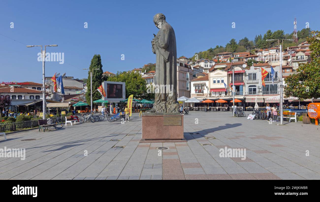 Ohrid, North Macedonia - October 23, 2023: Bronze Statue of Saint Clement Monument Historic Landmark in Town Park at Sunny Autumn Day. Stock Photo