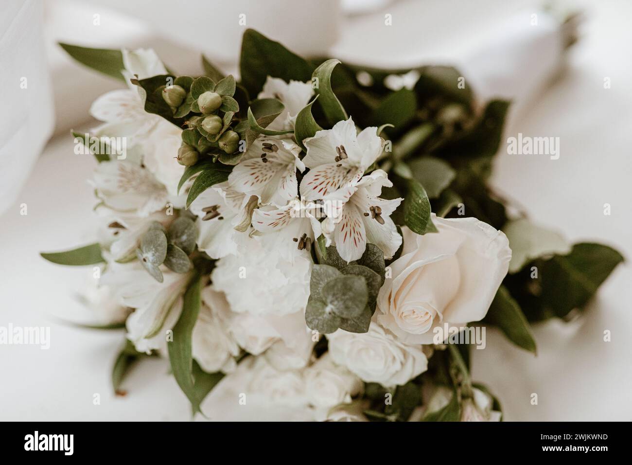 classic white wedding bouquet with roses and lilies Stock Photo Alamy