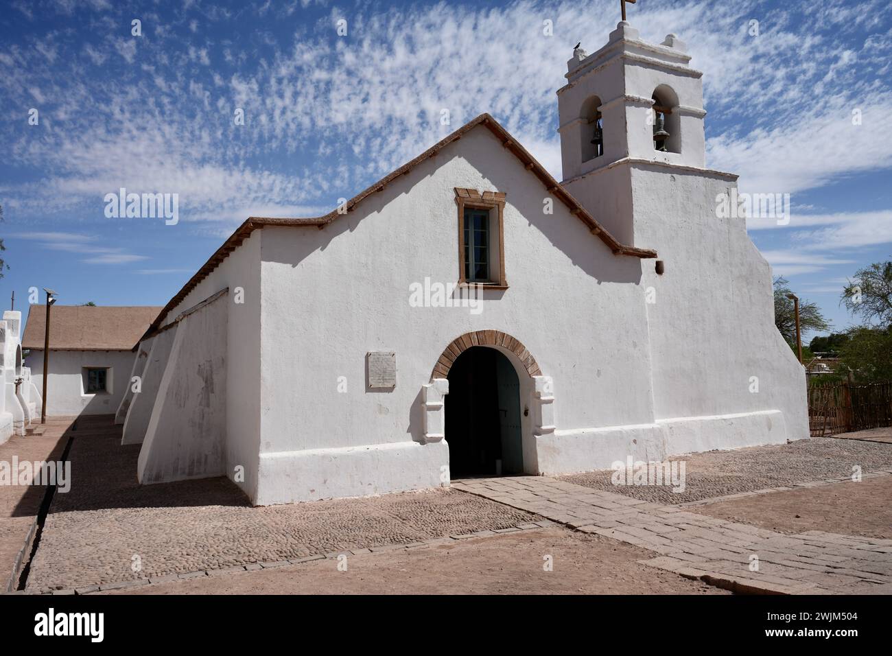 Iglesia San Pedro, an Historic church inside a walled compound, with adobe construction and a wooden ceiling. San Pedro de Atacama, Chile. Stock Photo