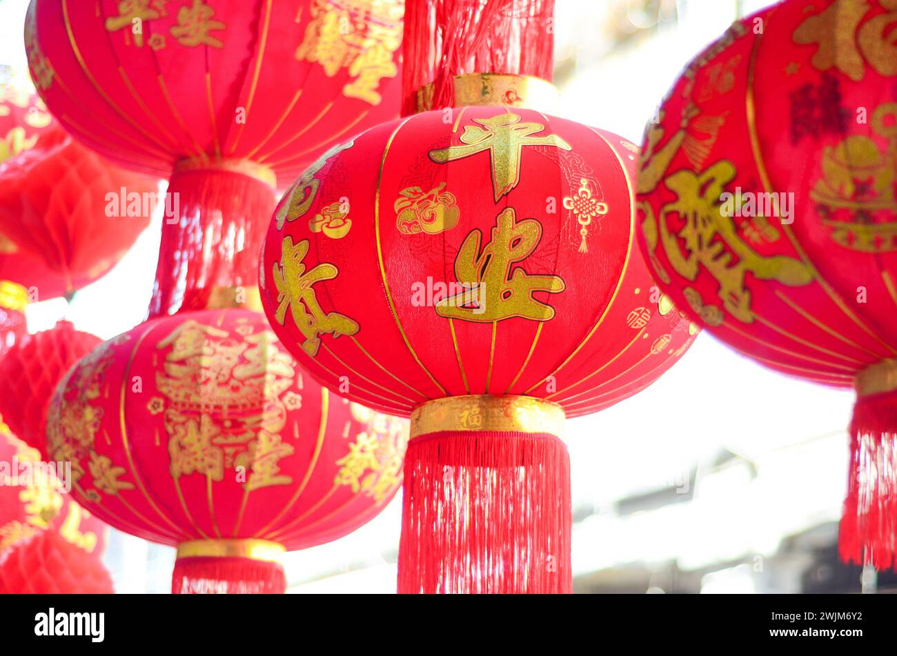 The traditional Chinese red lanterns hanging in front of people’s house ...