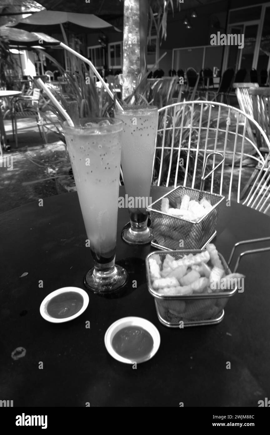The photo is a photo of light snacks of french fries and fresh drinks. The photo was taken at a cafe in Kebumen, Central Java Stock Photo