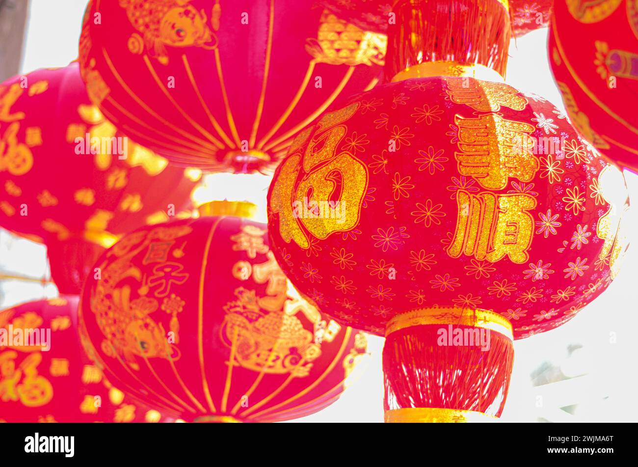 The traditional Chinese red lanterns hanging in front of people’s house ...