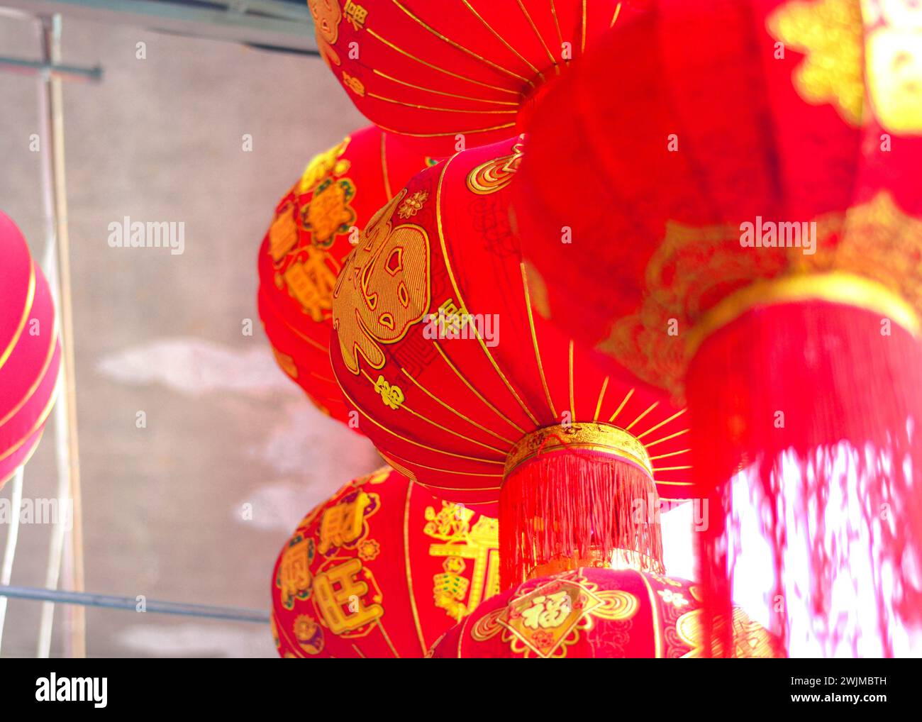 The traditional Chinese red lanterns hanging in front of people’s house ...