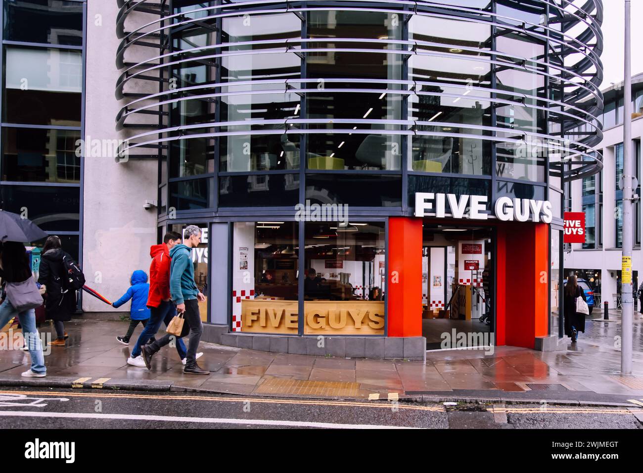 Five Guys restaurant entrance at Brighton, England, UK, Feb 2024