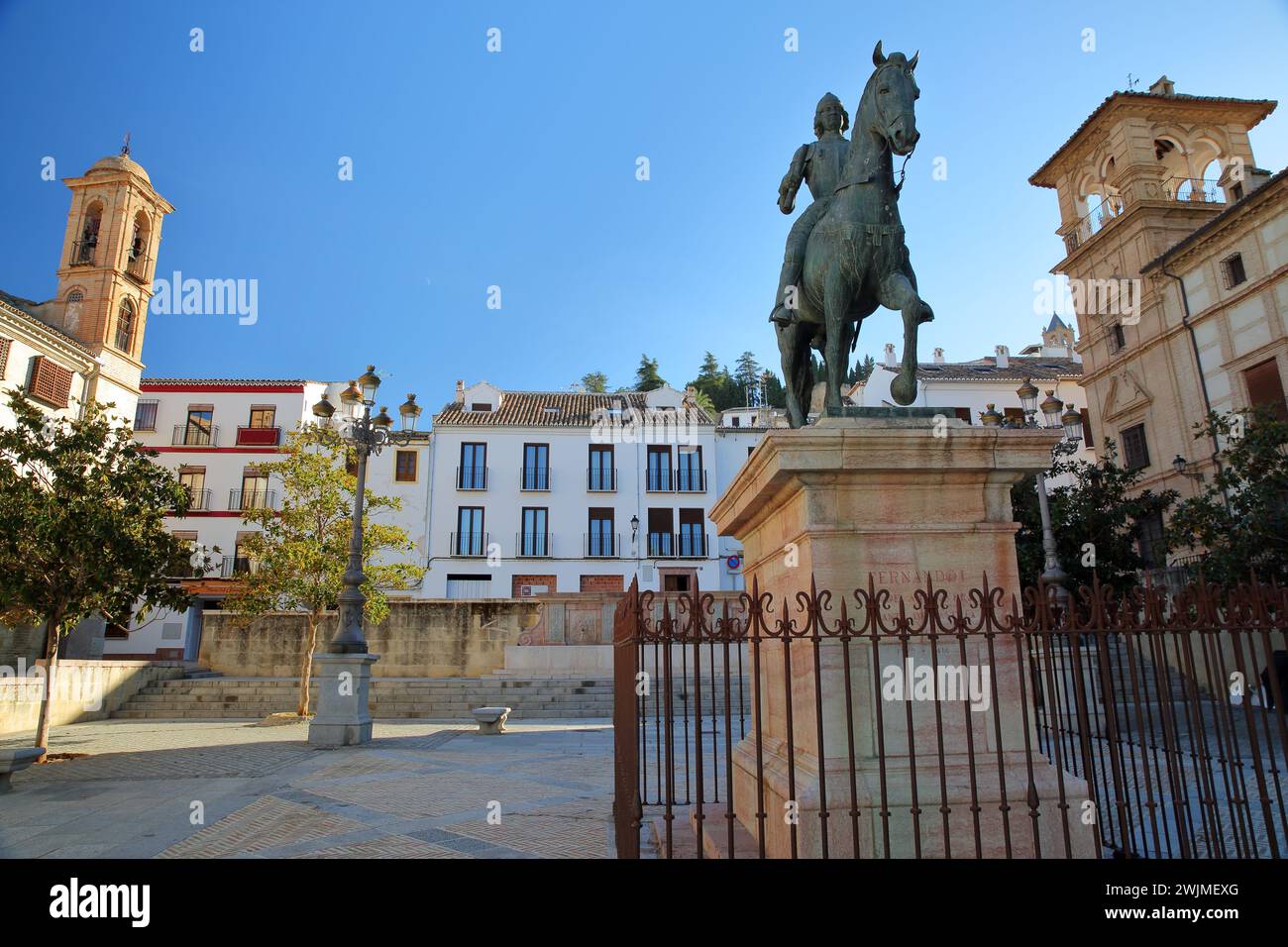 ANTEQUERA, ANDALUSIA, SPAIN - DECEMBER 17, 2023: Coso Viejo square with the equestrian statue of Ferdinand I, king of Aragon (unveiled in 2002 Stock Photo
