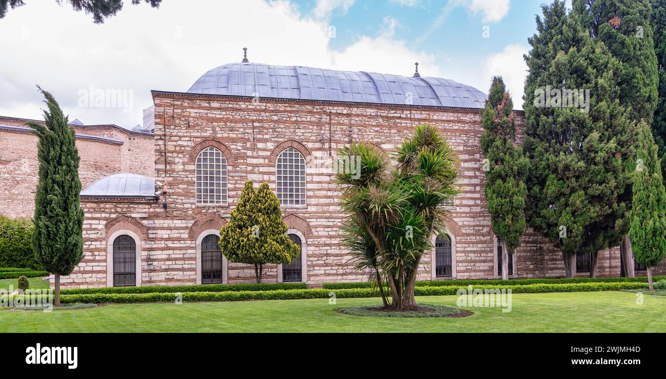 16th century Ottoman era Agalar Mosque with red bricks and distinctive blue roof located in the courtyard of Topkapi Palace, Istanbul, Turkey Stock Photo