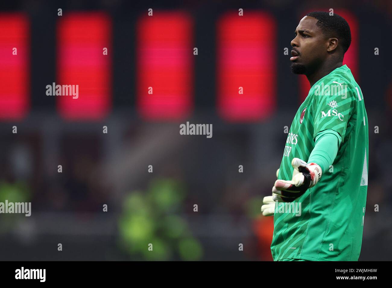 Milano, Italy. 15th Feb, 2024. Mike Maignan of Ac Milan gestures during the Uefa Europa League Play-off first leg match beetween Ac Milan and Stade Rennais Fc at Stadio Giuseppe Meazza on February 15, 2024 in Milano, Italy . Credit: Marco Canoniero/Alamy Live News Stock Photo