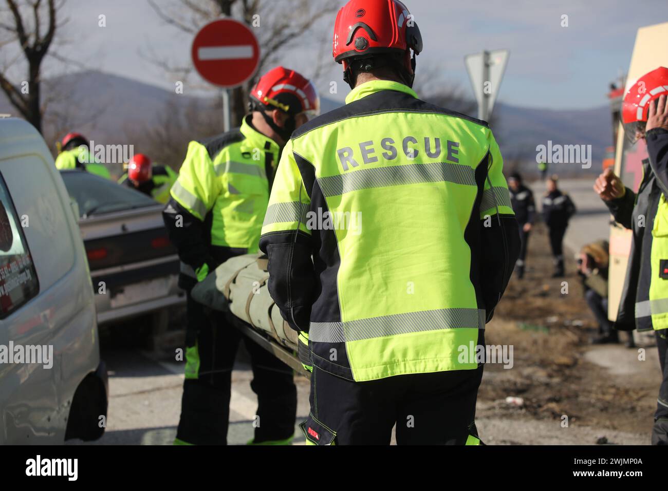 Fire and Rescue Imergency Units at car crash training on highway. Stock Photo