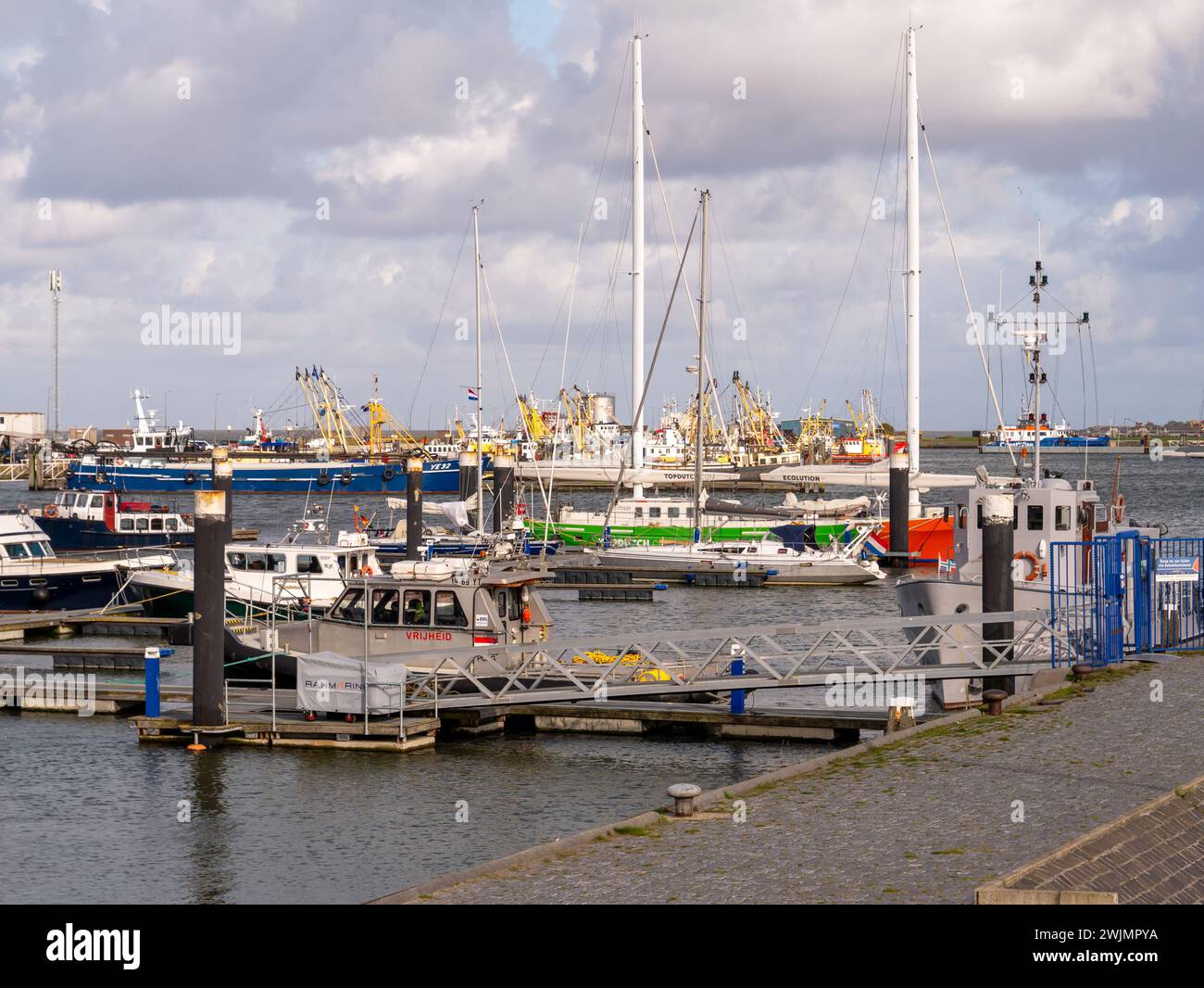 Marina and fishing harbor of Lauwersoog at Wadden Sea, Groningen, Netherlands Stock Photo