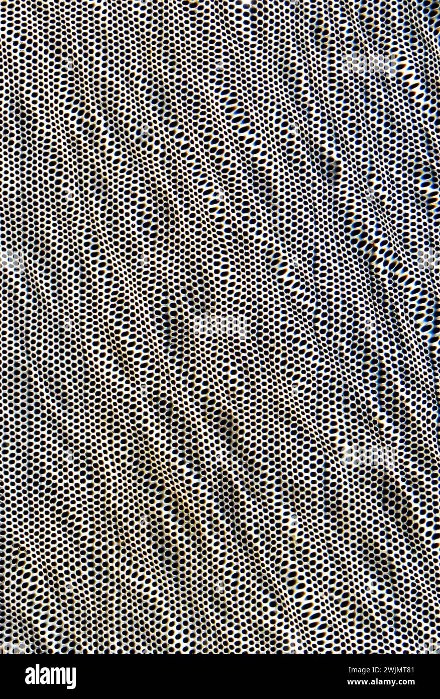 Perforated metal surface underwater texture background Stock Photo