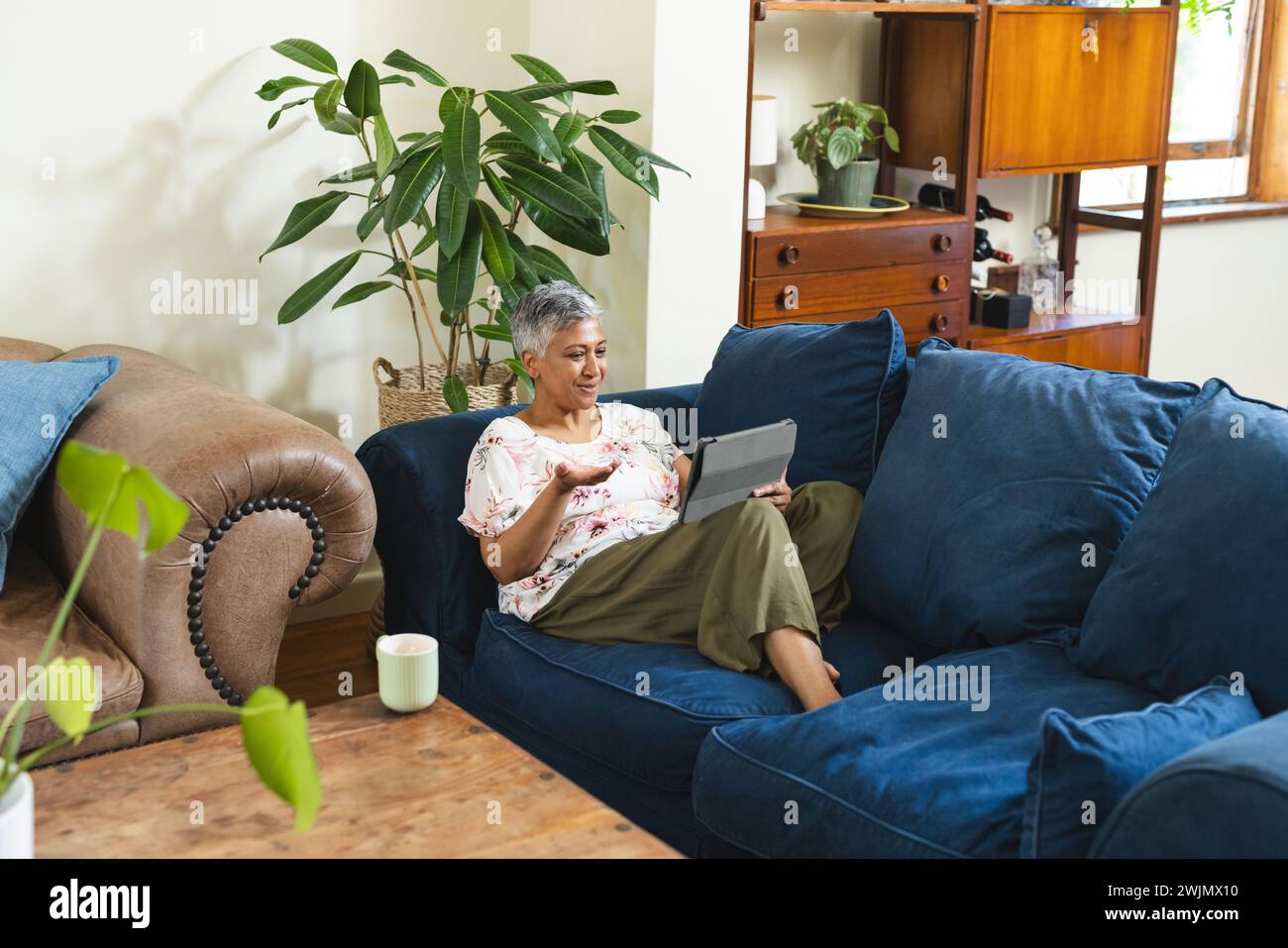 Mature woman enjoys modern hi-res stock photography and images - Alamy