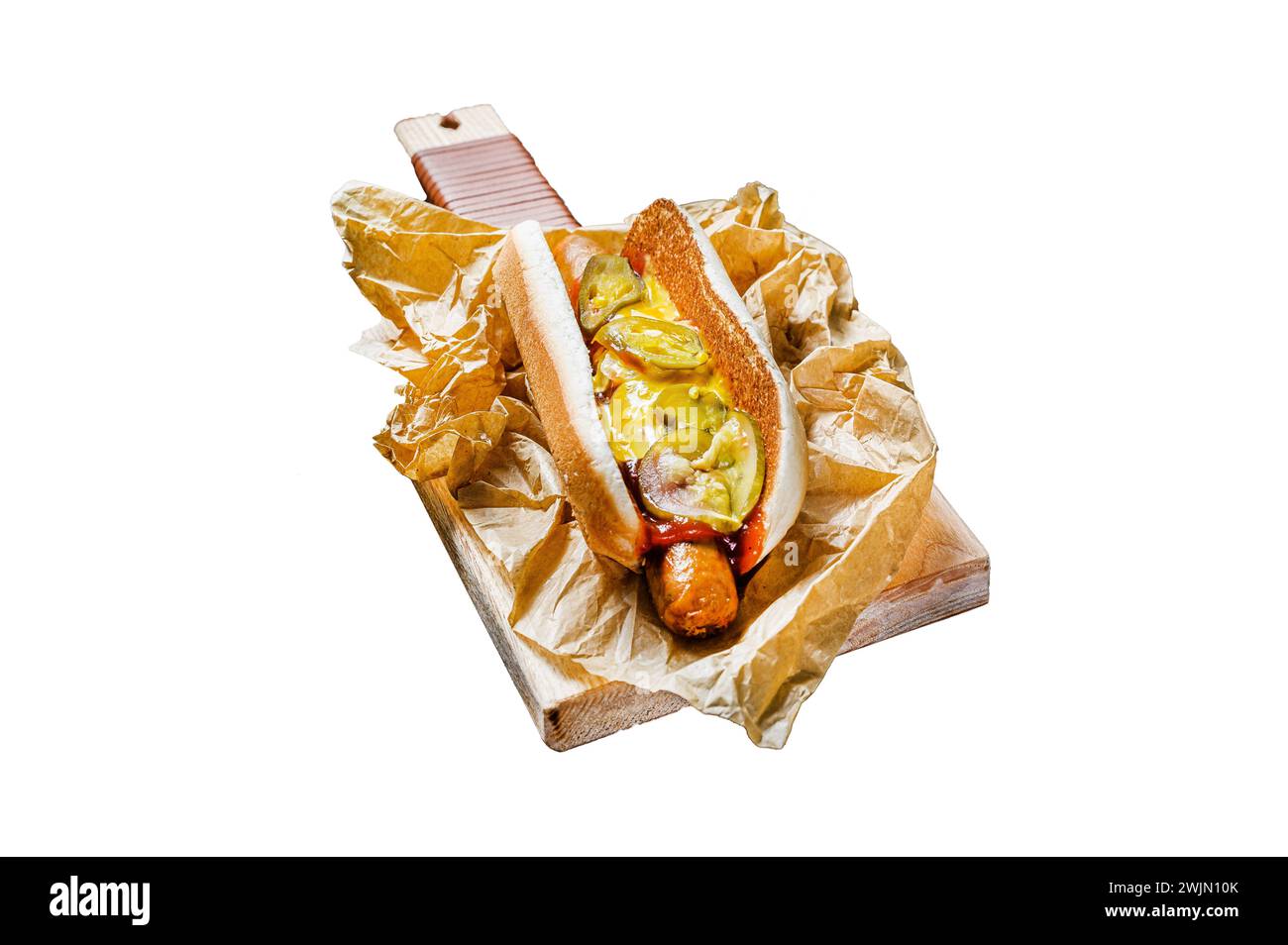 American hot dog with pork sausage on a wooden cutting Board in Kraft paper, fast food restaurant menu concept. Junk food. Isolated on white backgroun Stock Photo