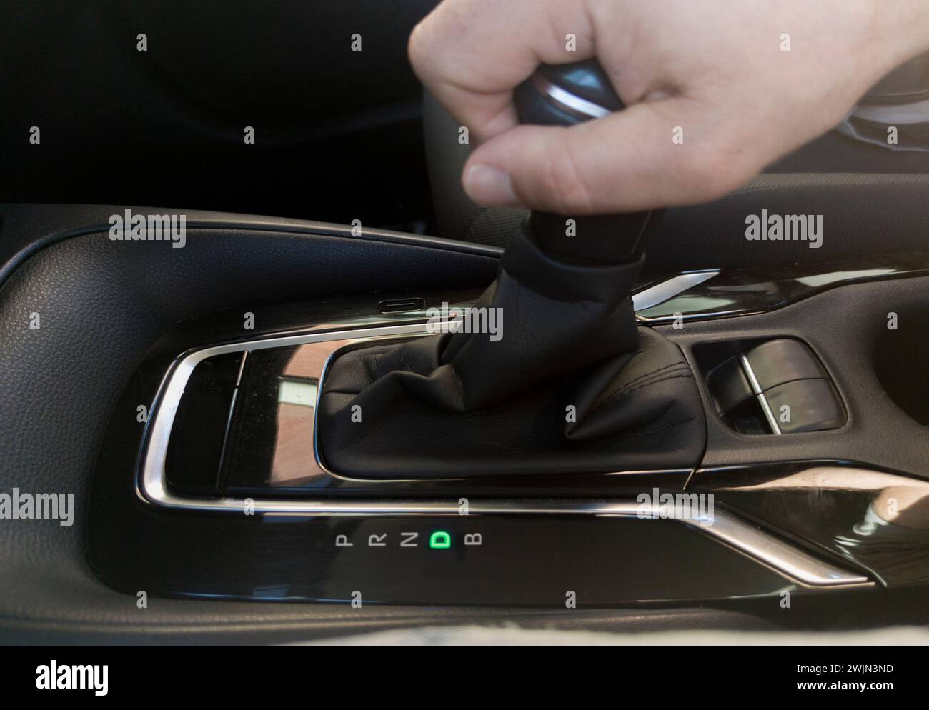 Driver driver putting D gear. Gear selector for an automatic transmission car Stock Photo