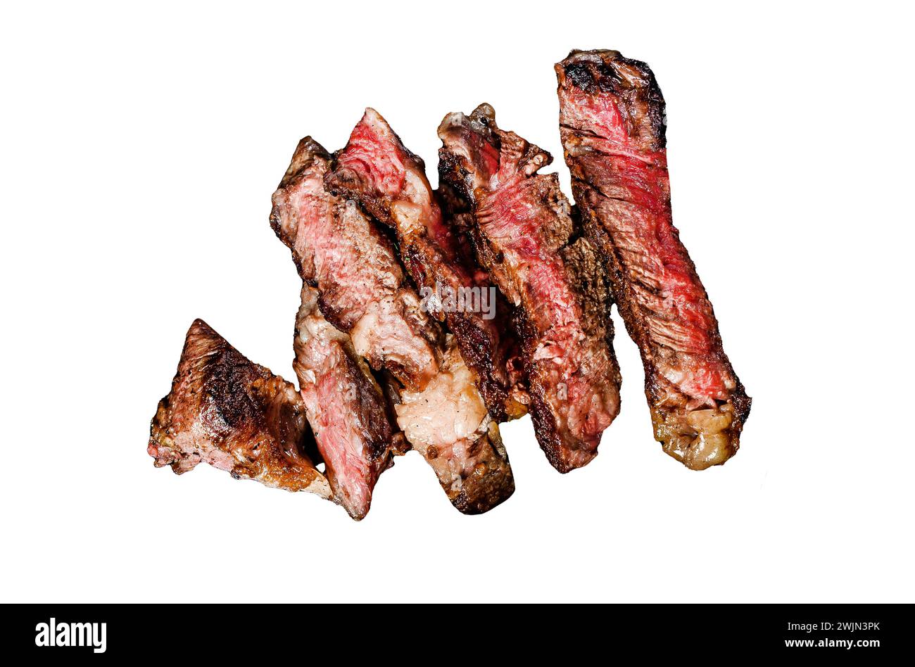Rib eye steak garnished Isolated on white background. Top view Stock ...