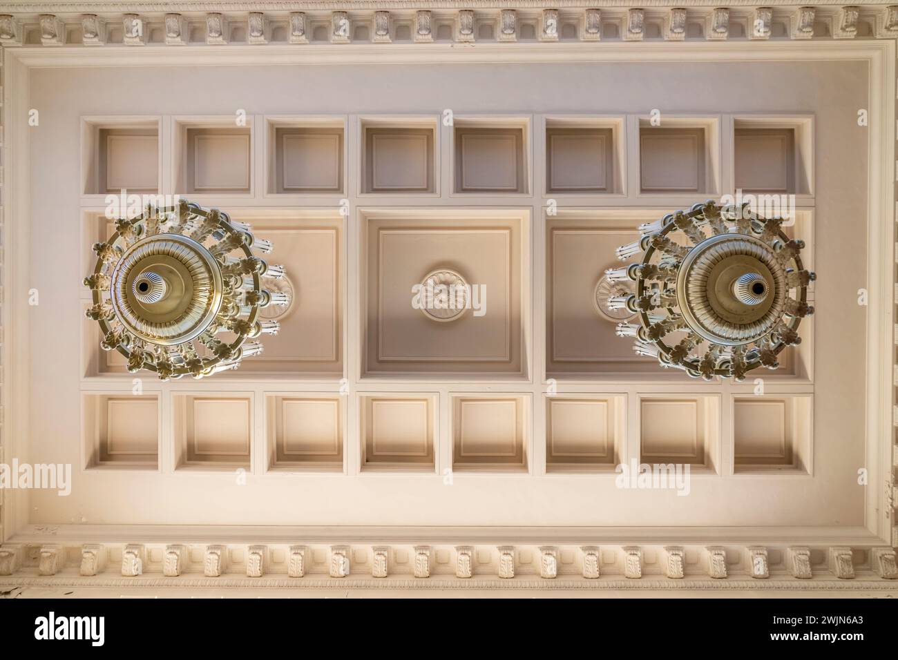 Vintage large vintage chandelier with candle light bulbs hanging from a ...