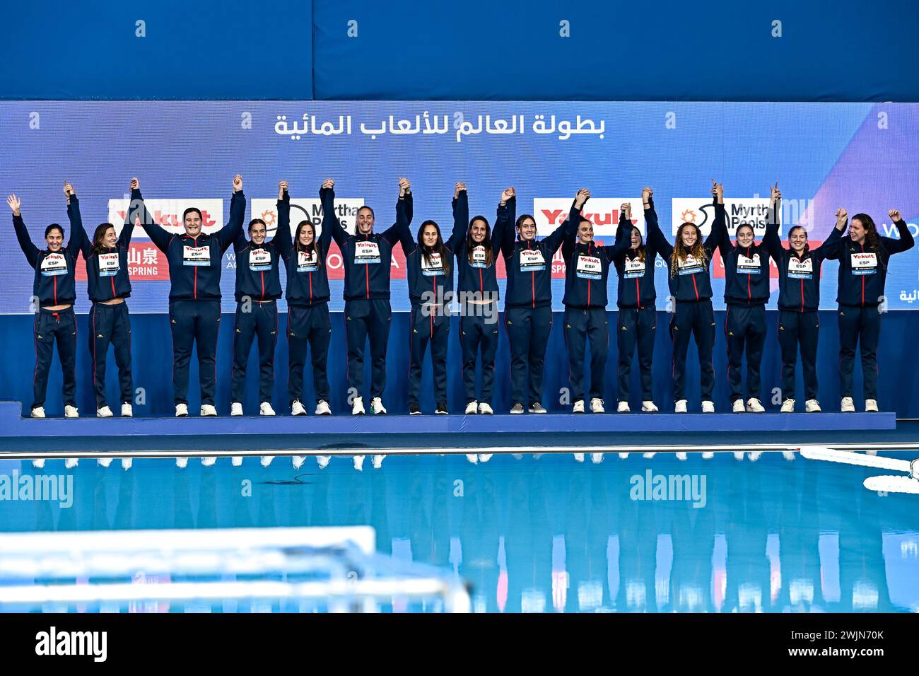 Doha, Qatar. 16th Feb, 2024. Athletes of Team Spain celebrate the 3rd place with a bronze medal after the water polo women 3rd/4th place match between team Spain (white caps) and team Greece (blue caps) during the 21st World Aquatics Championships at the Aspire Dome in Doha (Qatar), February 16, 2024. Credit: Insidefoto di andrea staccioli/Alamy Live News Stock Photo