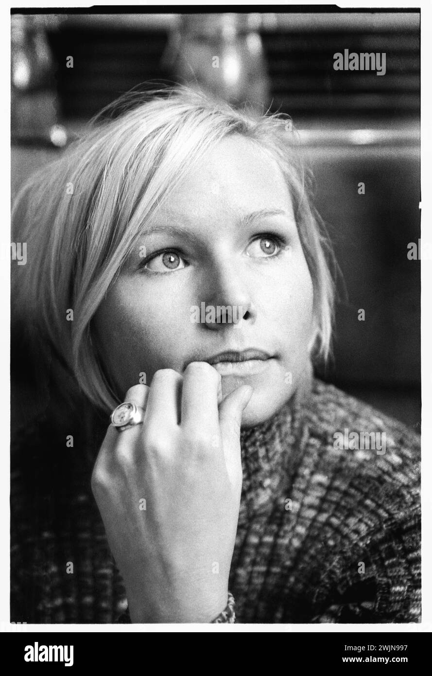 NINA PERSSON, PORTRAIT, 1996: A portrait of Swedish singer Nina Persson of the Cardigans at Al Bacio Italian Restaurant in Bristol, England , UK on 9 November 1996. Photo: Rob Watkins.  INFO: The Cardigans, a Swedish band formed in the early '90s, gained international fame with hits like 'Lovefool.' Their eclectic sound merges pop, rock, and indie elements, marked by Nina Persson's distinctive vocals and a penchant for catchy melodies Stock Photo