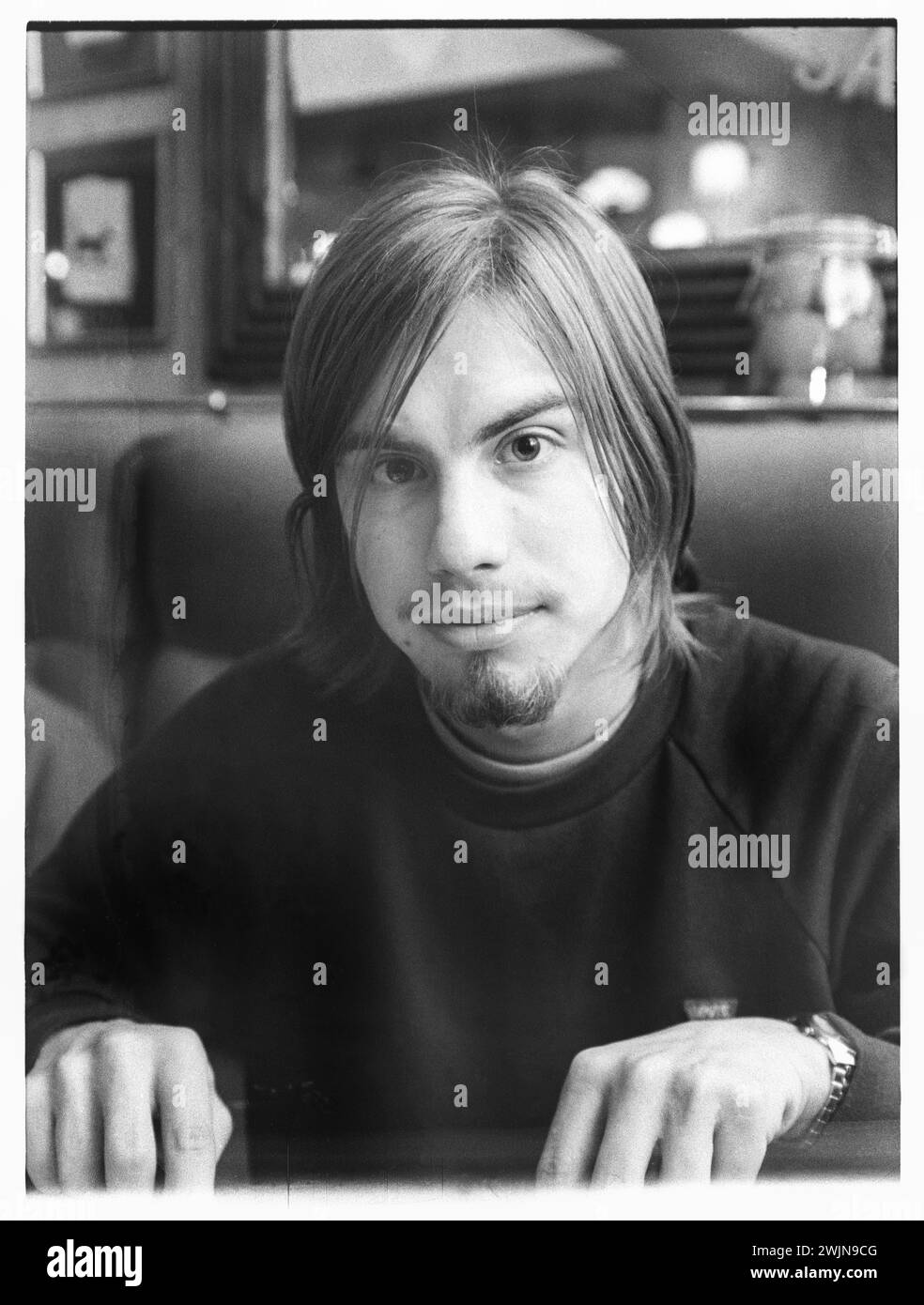 BENGT LAGERBERG, PORTRAIT, 1996: A portrait of Swedish drummer Bengt Lagerberg of the Cardigans at Al Bacio Italian Restaurant in Bristol, England , UK on 9 November 1996. Photo: Rob Watkins.  INFO: The Cardigans, a Swedish band formed in the early '90s, gained international fame with hits like 'Lovefool.' Their eclectic sound merges pop, rock, and indie elements, marked by Nina Persson's distinctive vocals and a penchant for catchy melodies Stock Photo