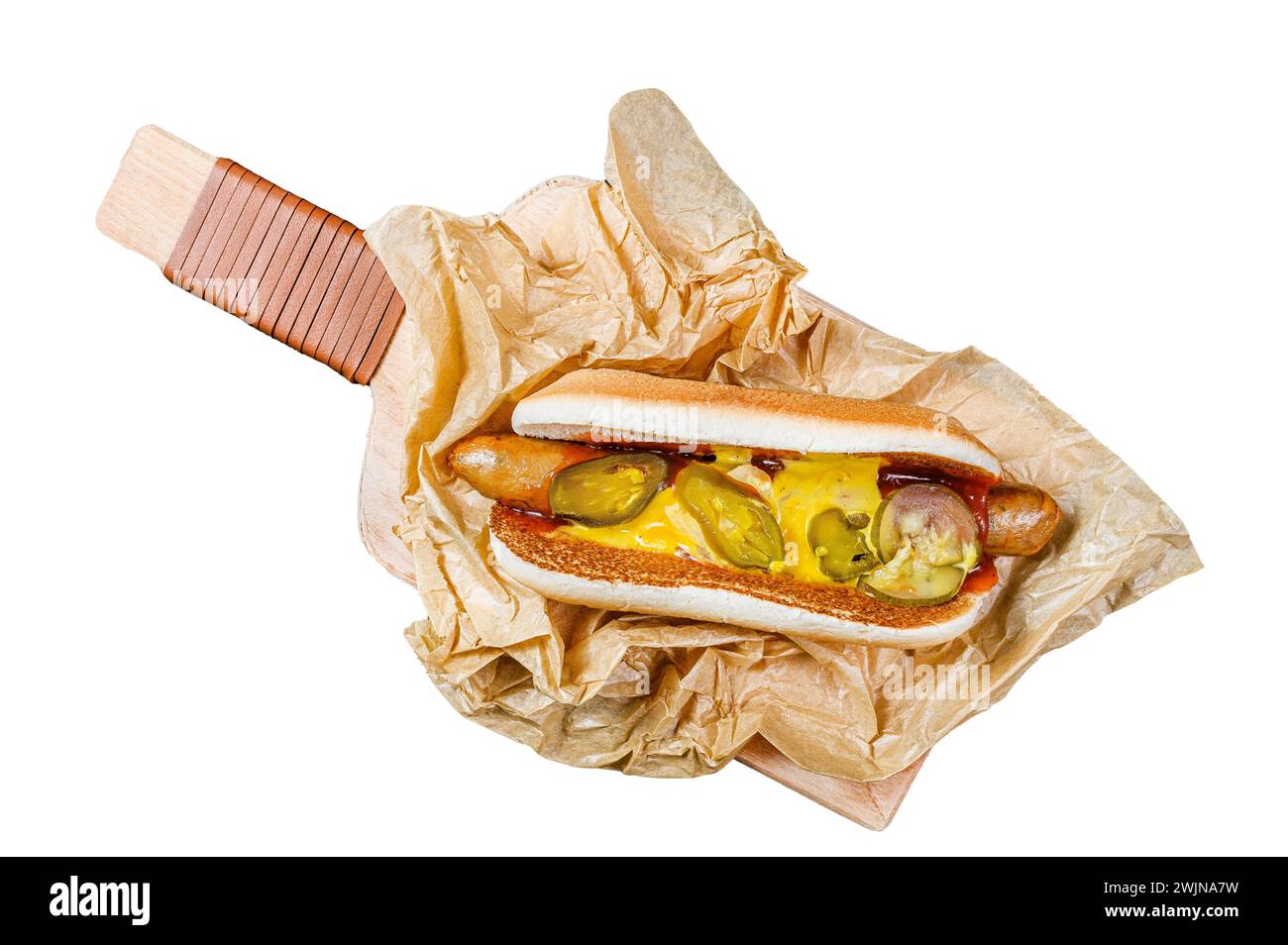 American hot dog with pork sausage on a wooden cutting Board in Kraft paper, fast food restaurant menu concept. Junk food Isolated on white background Stock Photo