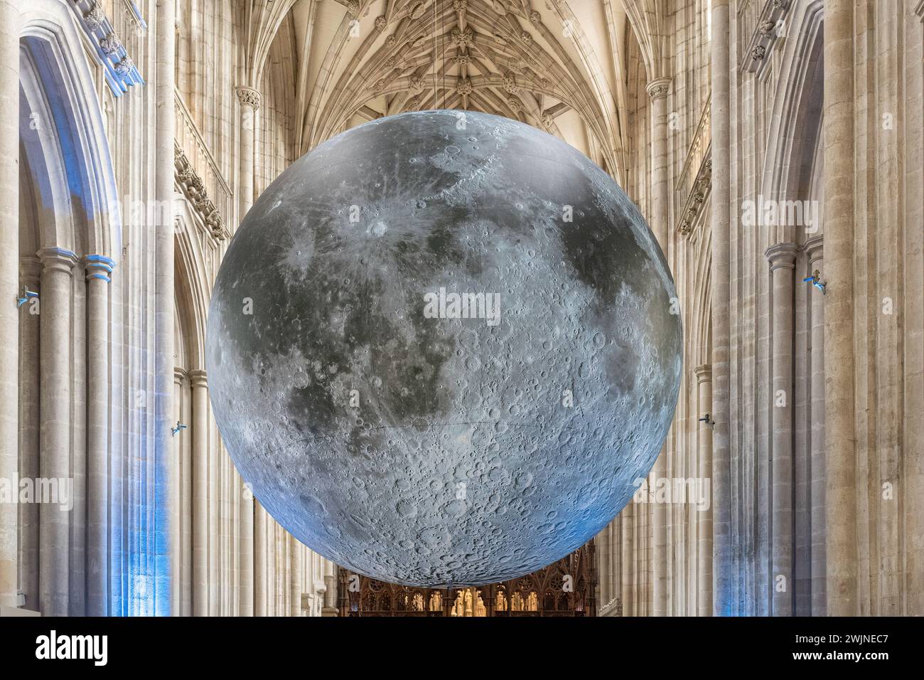 16th February 2024. The Museum of the Moon artwork by UK artist Luke Jerram is currently on display in Winchester Cathedral, Hampshire, England, UK.  The large-scale art installation has been touring the globe. It is attracting many visitors to the cathedral, and a number of events are planned while it is on show here. Stock Photo