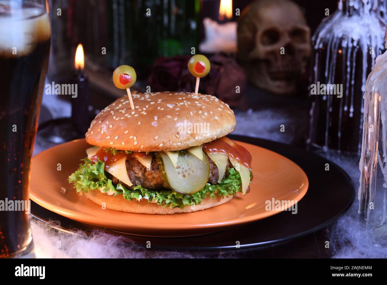 The Monster Burger will definitely lift your spirits and is the perfect snack for a Halloween party. Stock Photo