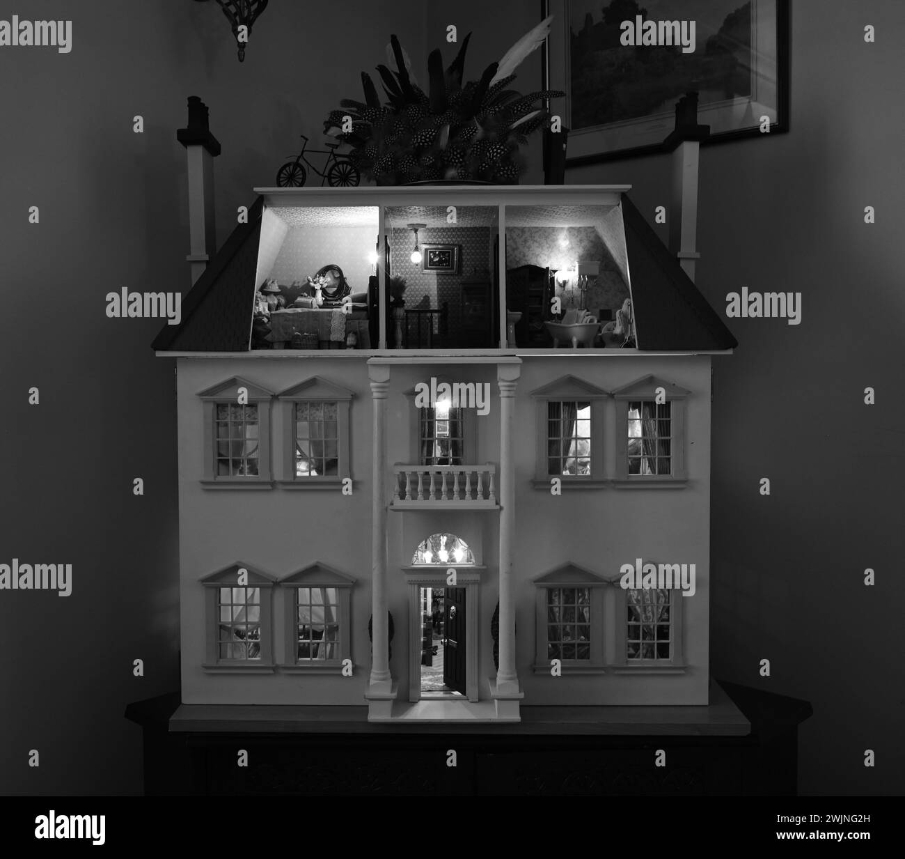 The exterior of a Victorian Dolls house at night Stock Photo Alamy