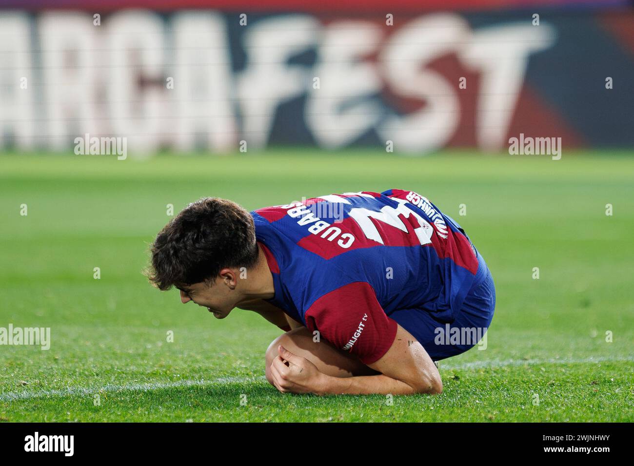 Barcelona, Spain. 11th Feb, 2024. Pau Cubarsi in action after receiving a fault during the LaLiga EA Sports match between FC Barcelona and Granada CF Stock Photo
