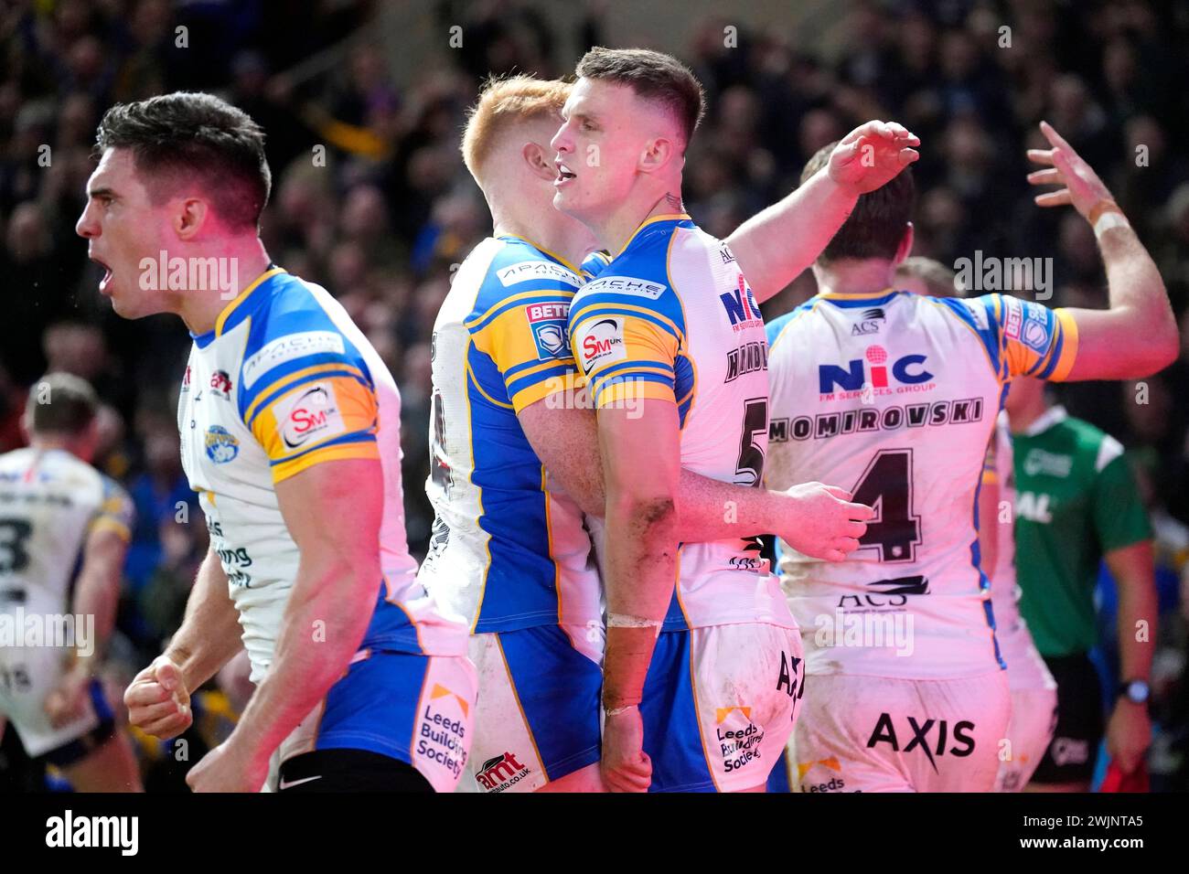 Leeds Rhinos' Ash Handley (centre) celebrates scoring his side's first ...