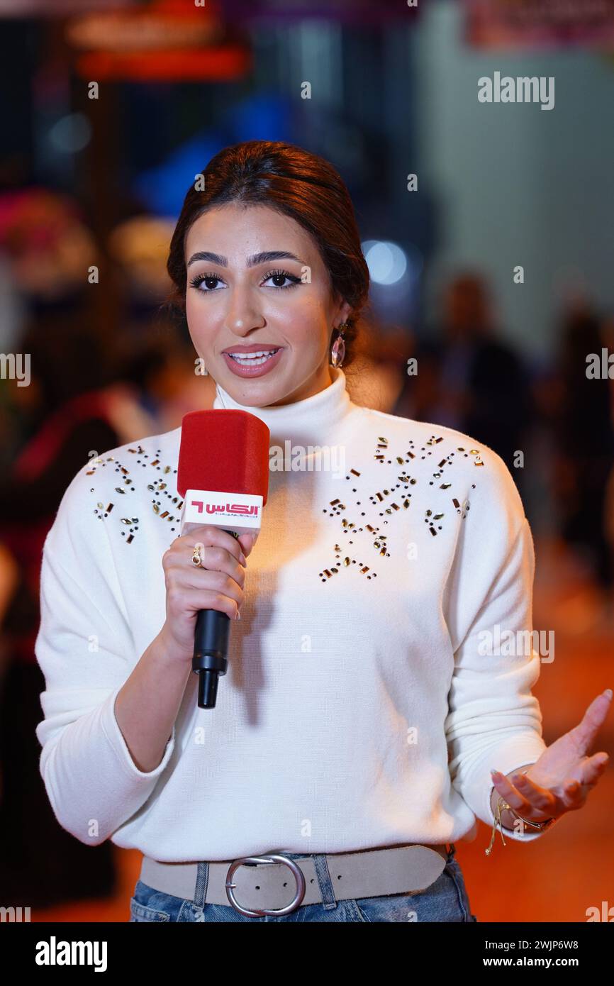 TV anchors of Qatar interviewing fans during Qatar TotalEnergies Open 2024 played at the Khalifa