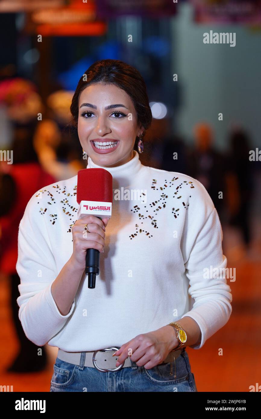 TV anchors of Qatar interviewing fans during Qatar TotalEnergies Open 2024 played at the Khalifa