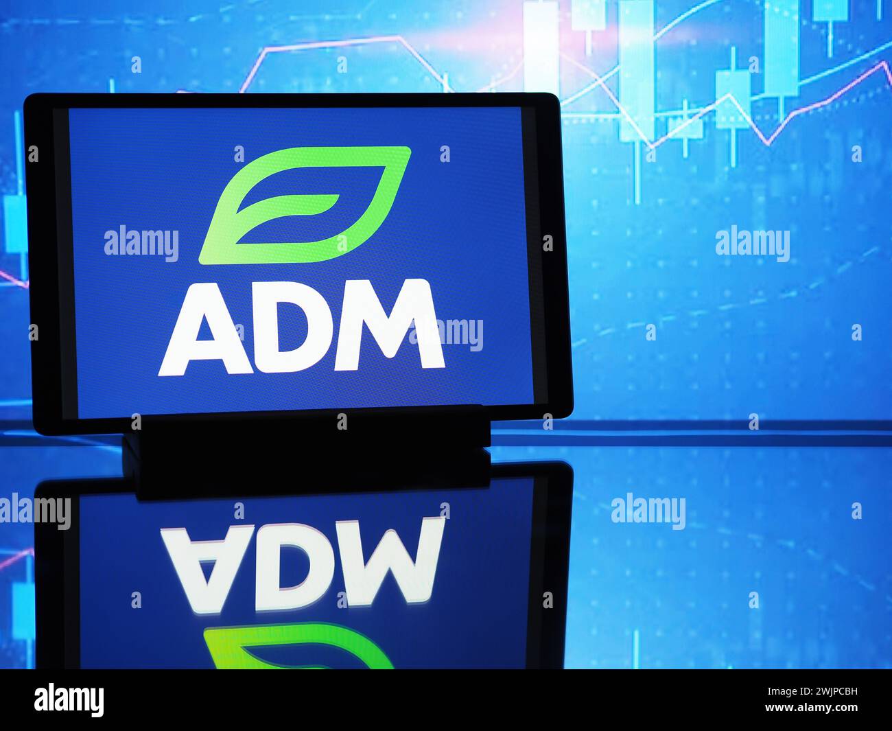 In this photo illustration, the Archer Daniels Midland Company logo seen displayed on a tablet