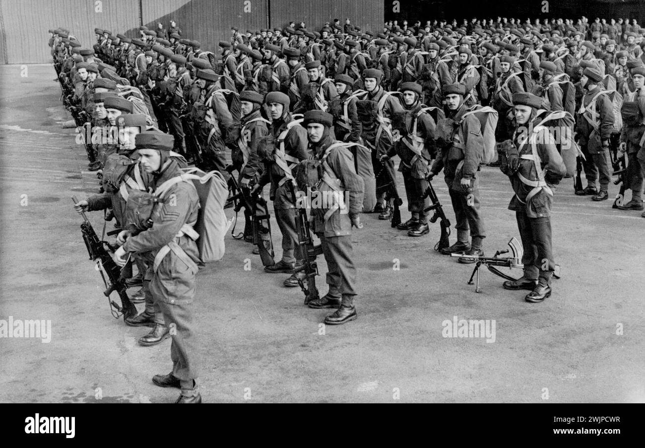 Britain's Paratroops in Training -- Paratroops before emplaning. These Pictured taken at an R.A.F. Station where parachute troops are in training show the varied activities of members of Britain's newest 'Army' who are in training for the important part they will have to play when Britain takes the offensive on land. October 24, 1941. (Photo by Planet News Ltd.). Stock Photo