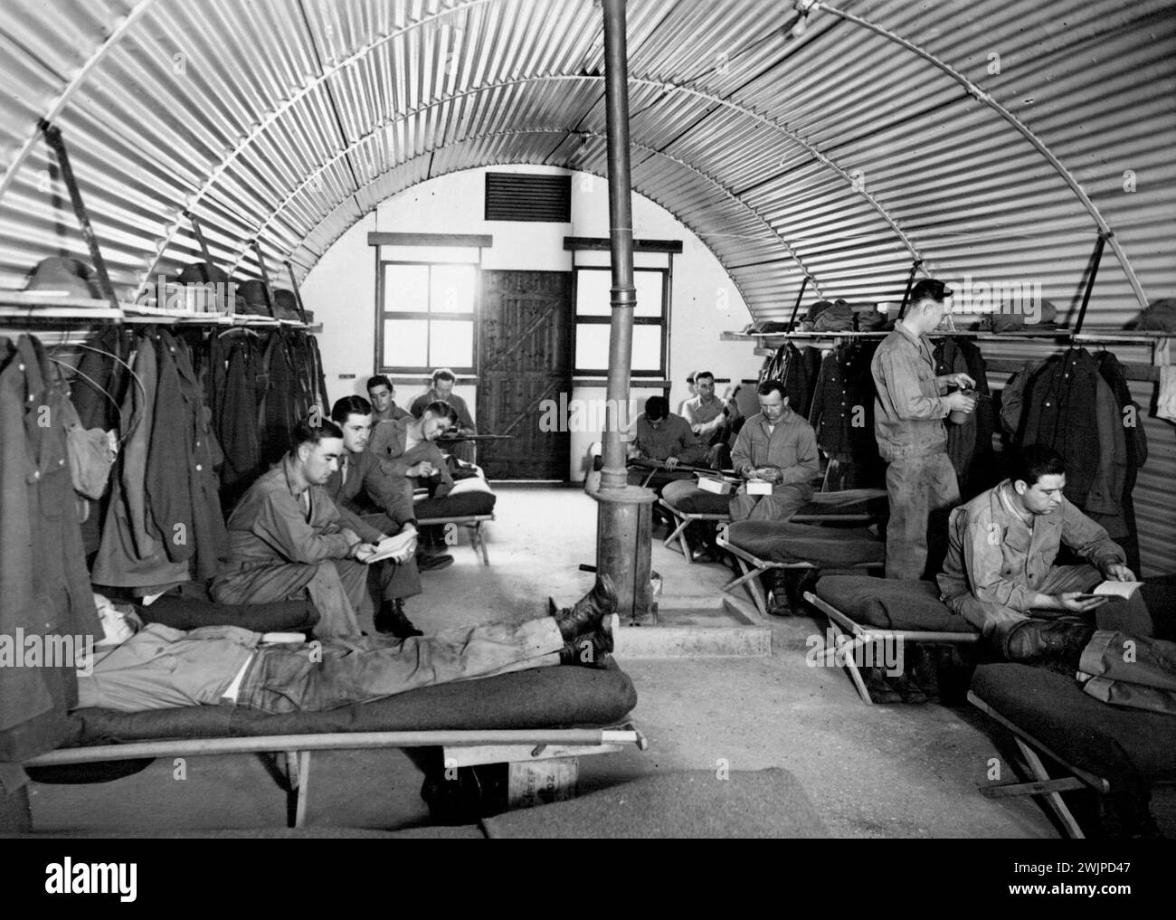 ***** U.S.A. Army Camps In England -- The interior of one of the comfortable huts, in the Some Counties. To house the growing American Army in England, the: U.S.A. Corps of Engineers, are erecting a number of camps all over the country: The ground is cleared, and a huge permanent camp erected. Practically all British material is used) and in a few weeks the camp is ready for occupation. September 18, 1942. Stock Photo