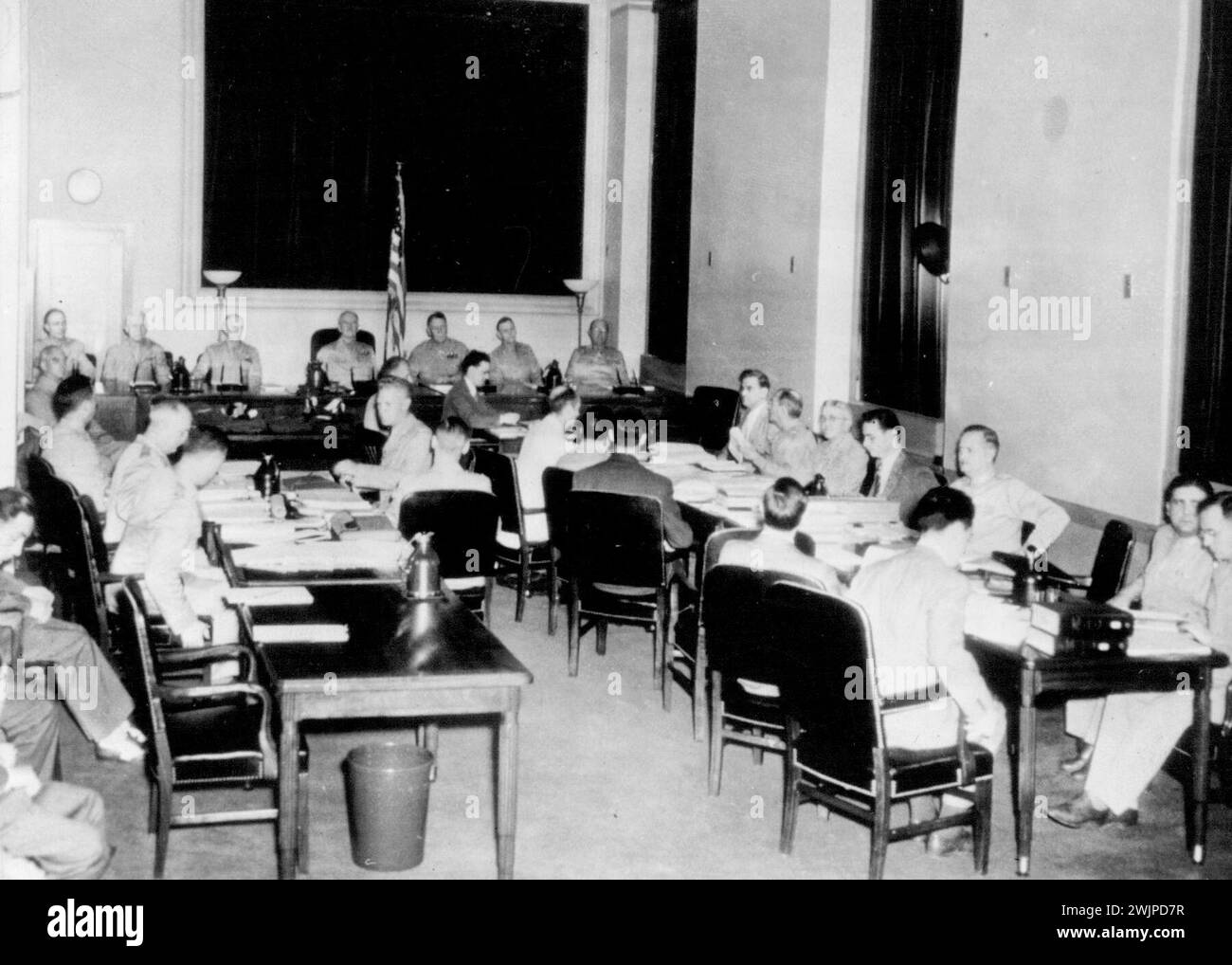 U.S. Smashes Nazi Spy Plot -- These rare photographs show a U.S. military commission sitting in judgment in Washington on eight Nazis who have confessed they were landed from German submarines with orders to sabotage the U.S. war effort. They were caught by America's alert Federal Bureau of Investigation agents a few hours after they had sneaked into the country out their plans. Moreover, their confessions have resulted in the arrest of 14 persons, including six women, who were supposed to help them. January 01, 1951. Stock Photo