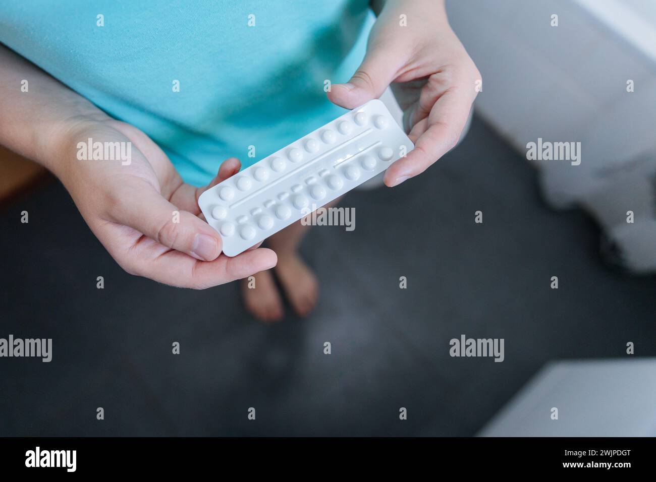 Turquoise Birth Control Top view unrecognizable young hi-res stock photography and images - Alamy