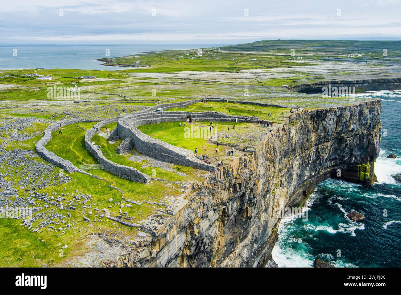 Aerial view of Dun Aonghasa or Dun Aengus , the largest prehistoric stone fort of the Aran Islands, popular tourist attraction, important archaeologic Stock Photo