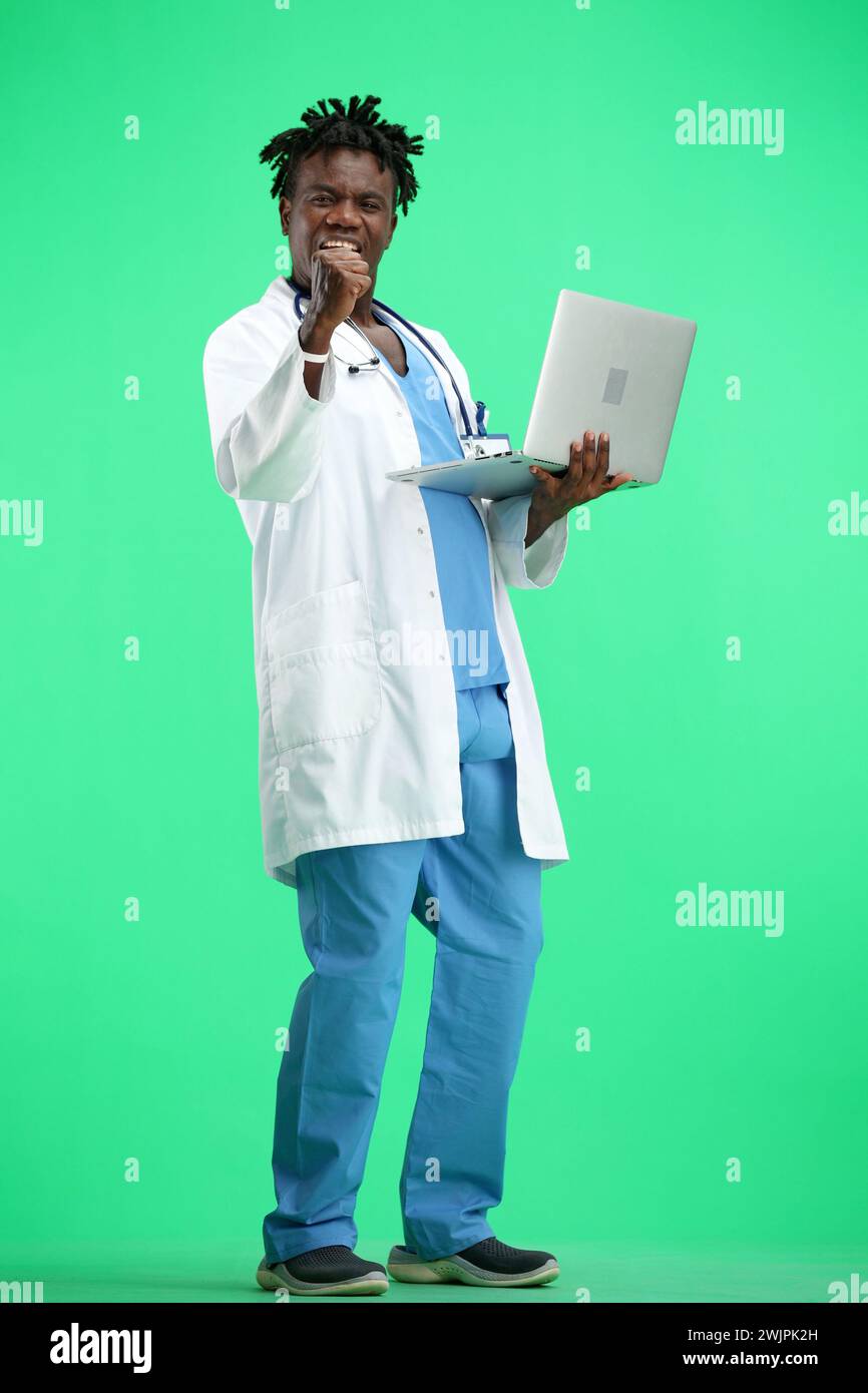 Doctor working on computer green hi-res stock photography and images ...