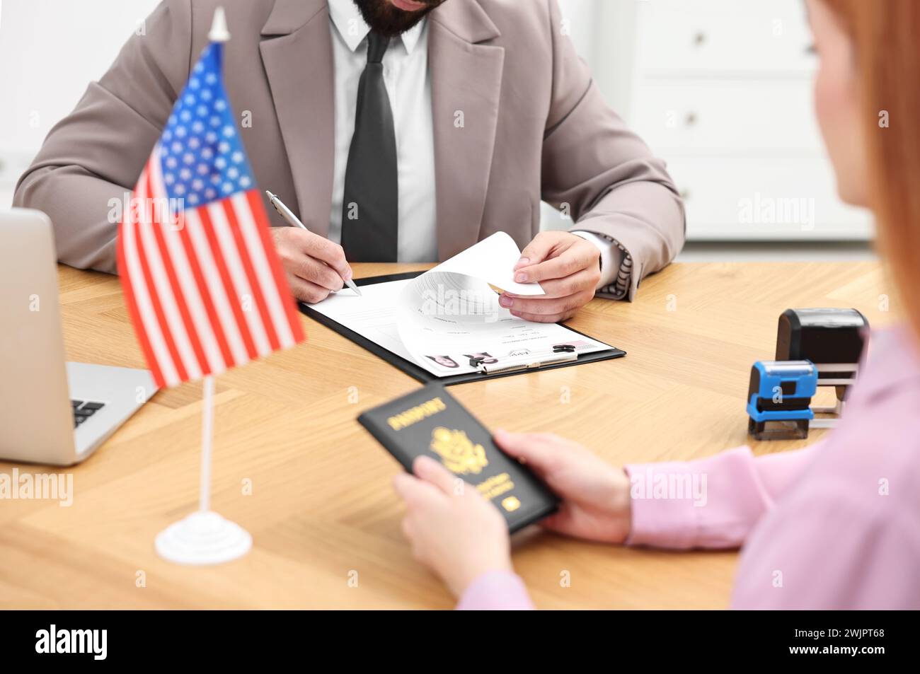 Immigration to United States of America. Embassy worker approving visa ...