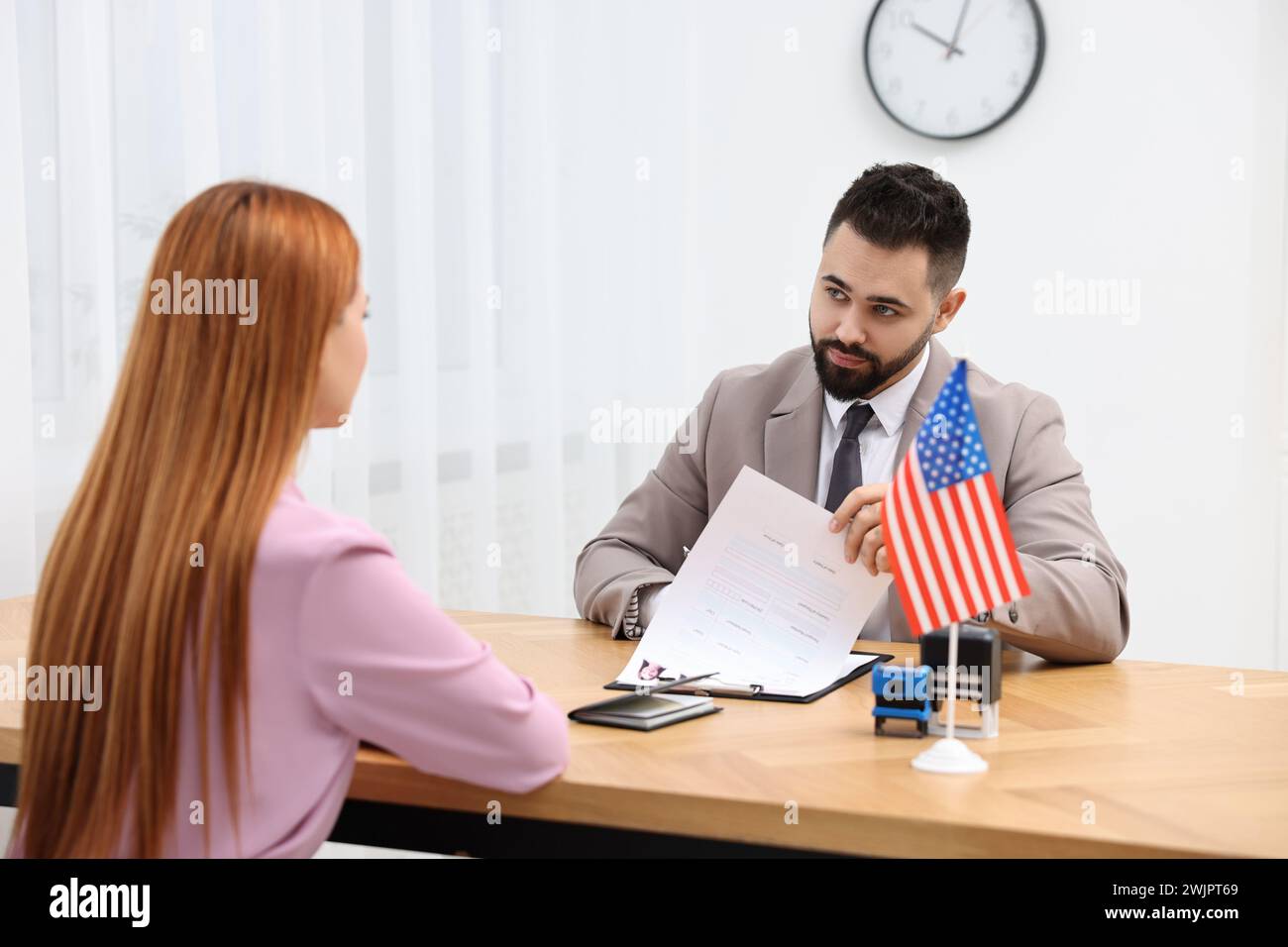 Immigration to United States of America. Embassy worker approving visa ...
