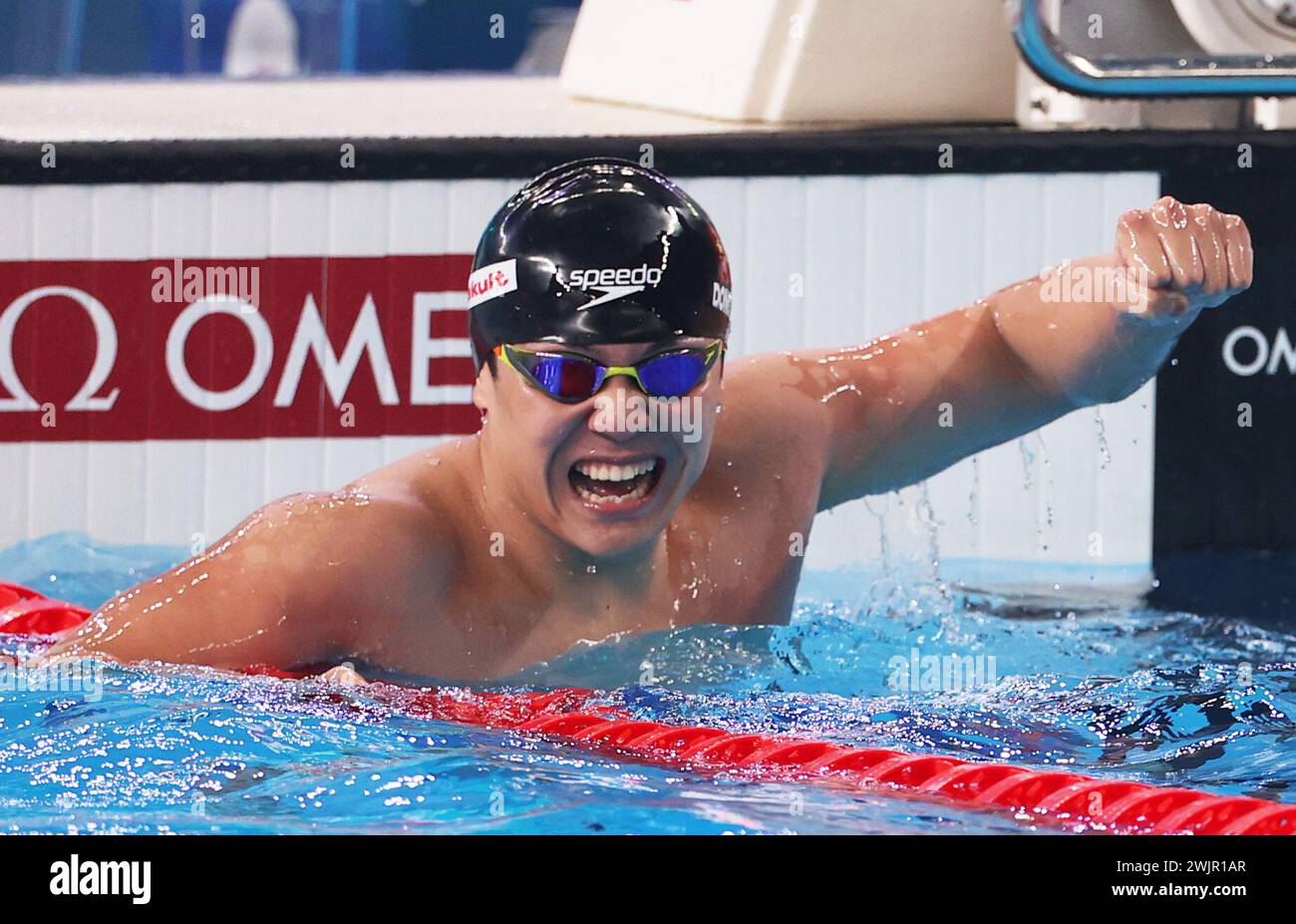 Doha, Qatar. 16th Feb, 2024. Dong Zhihao of China celebrates after