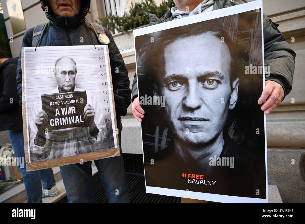 New York, USA. 16th Feb, 2024. People hold signs during a vigil for ...