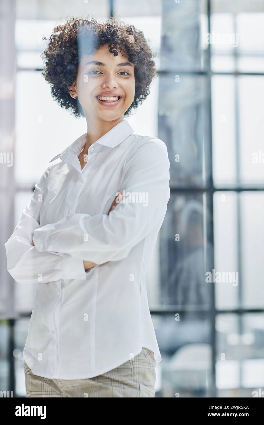 business woman looks admiringly into the distance through the glass ...