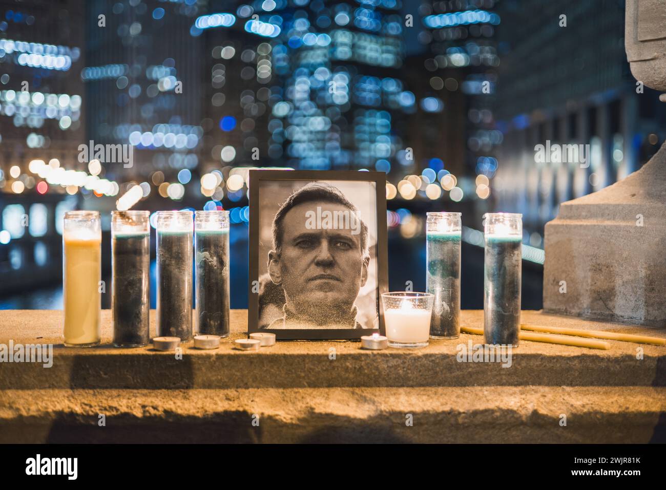 Chicago, USA. 16th Feb 2024. Candles and a photo of Alexei Navalny's memorializing his death today, in downtown Chicago. Credit: JankPhoto.com/Alamy Live News. Stock Photo