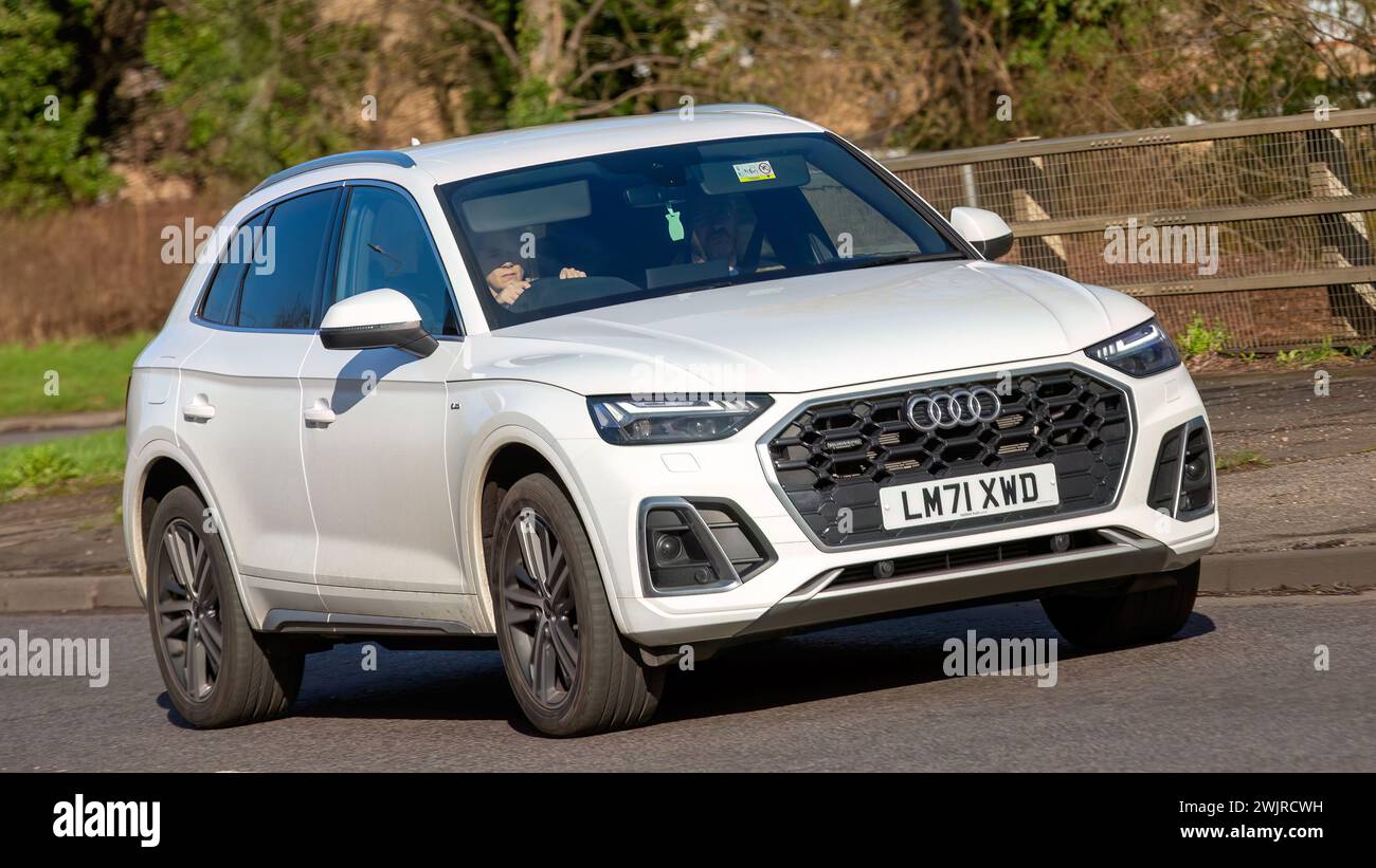 Milton Keynes,UK-Feb 16th 2024: 2021 white hybrid electric Audi Q5 car  driving on an English road Stock Photo
