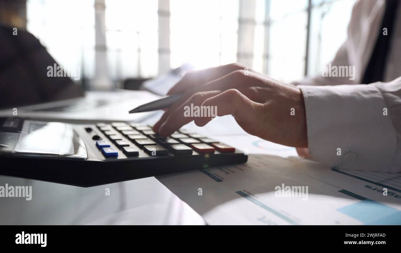 Report calculating hi-res stock photography and images - Alamy