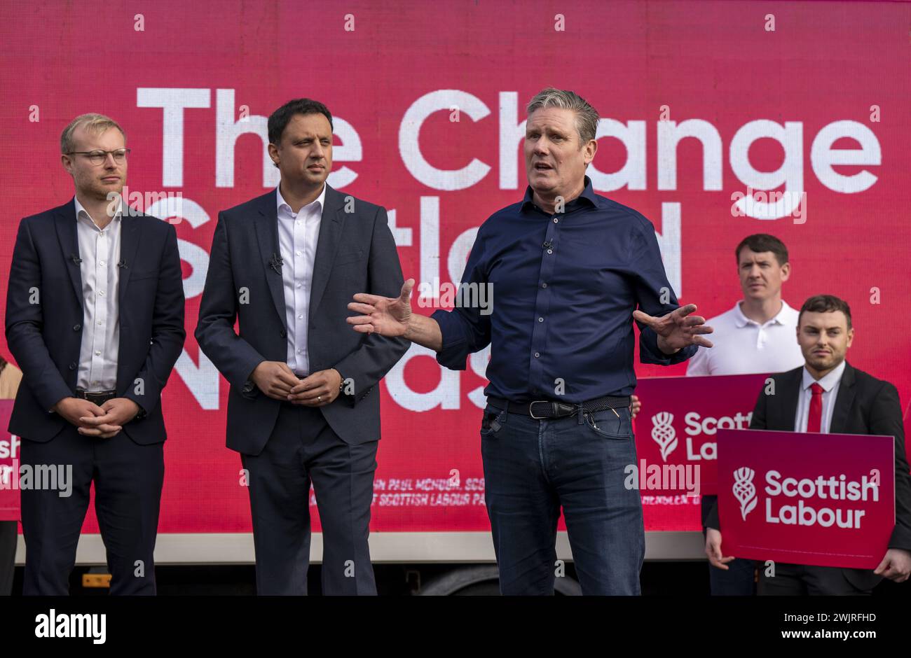 File photo dated 06/10/23 of Labour leader Sir Keir Starmer with Scottish Labour leader Anas Sarwar (centre) and the new Labour MP for Rutherglen and Hamilton West Michael Shanks (left) at a rally following Scottish Labour's win in Rutherglen and Hamilton West by-election. The SNP is calling on Scottish Labour to whip its two MPs to vote for an immediate ceasefire in Gaza, ahead of a vote in the House of Commons next week. Issue date: Saturday February 17, 2024. Stock Photo