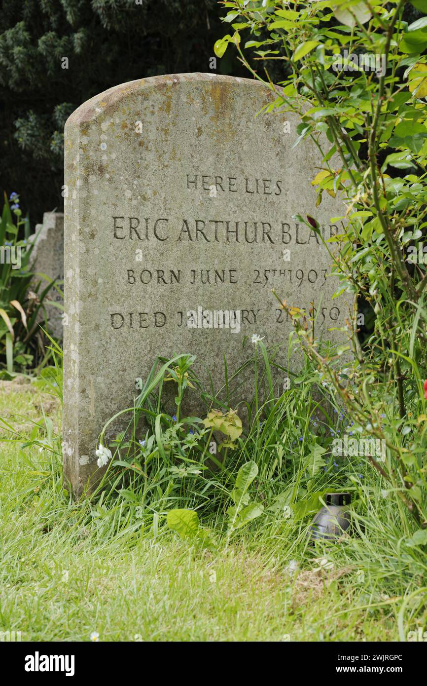 The grave of Eric Arthur Blair - George Orwell - in the churchyard of All Saints Church, Sutton Courtney, Oxfordshire, England Stock Photo