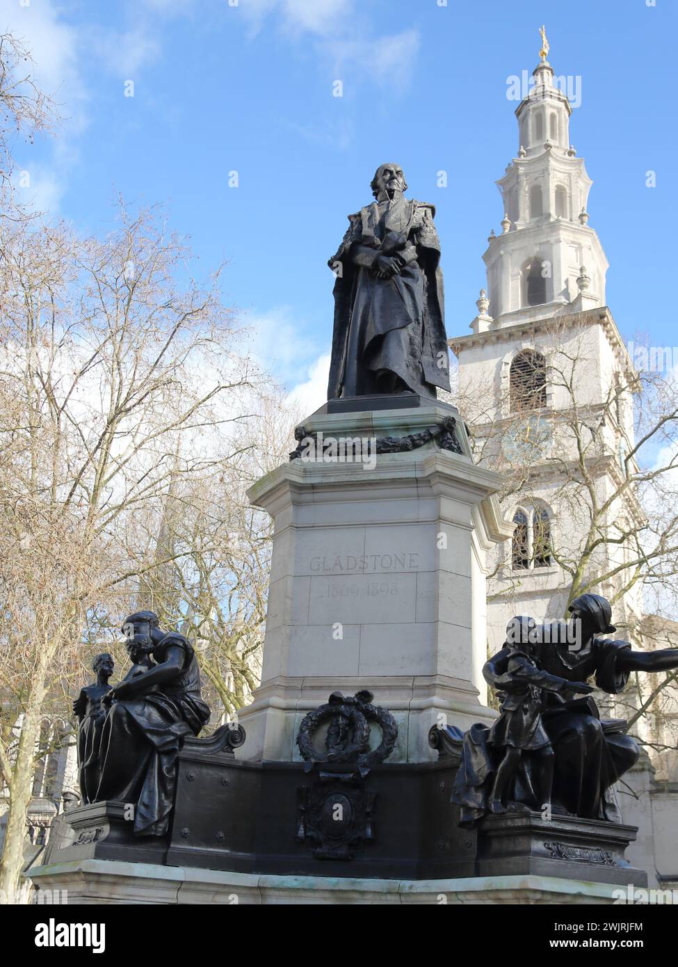 Bronze statue of former British Prime Minister William Gladstone outside St Clement Danes Church at the Strand, London, UK Stock Photo